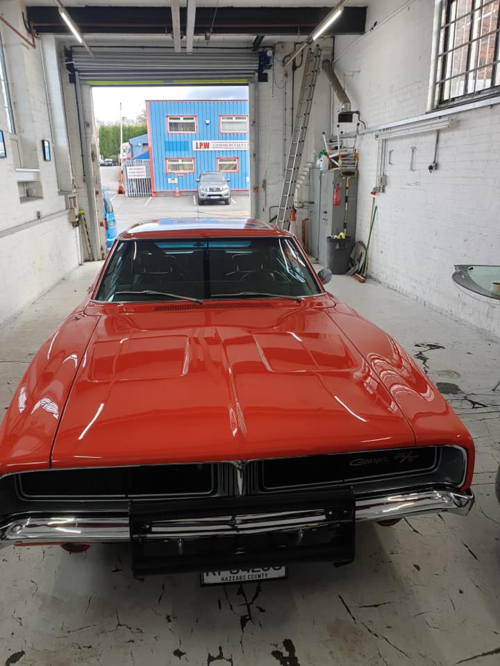 Classic car in AutoGlaze workshop